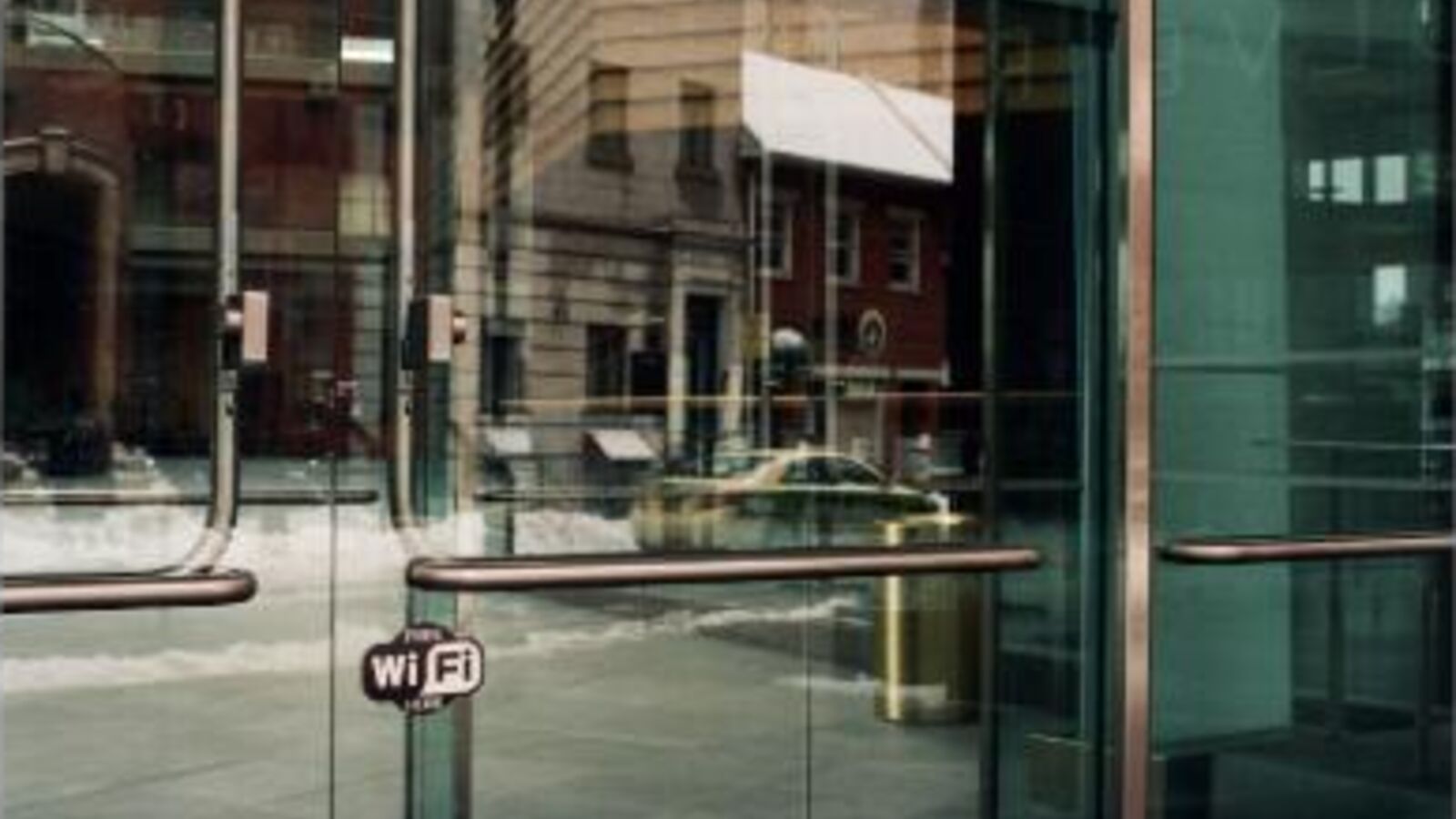 Commercial entrance doors with security window film