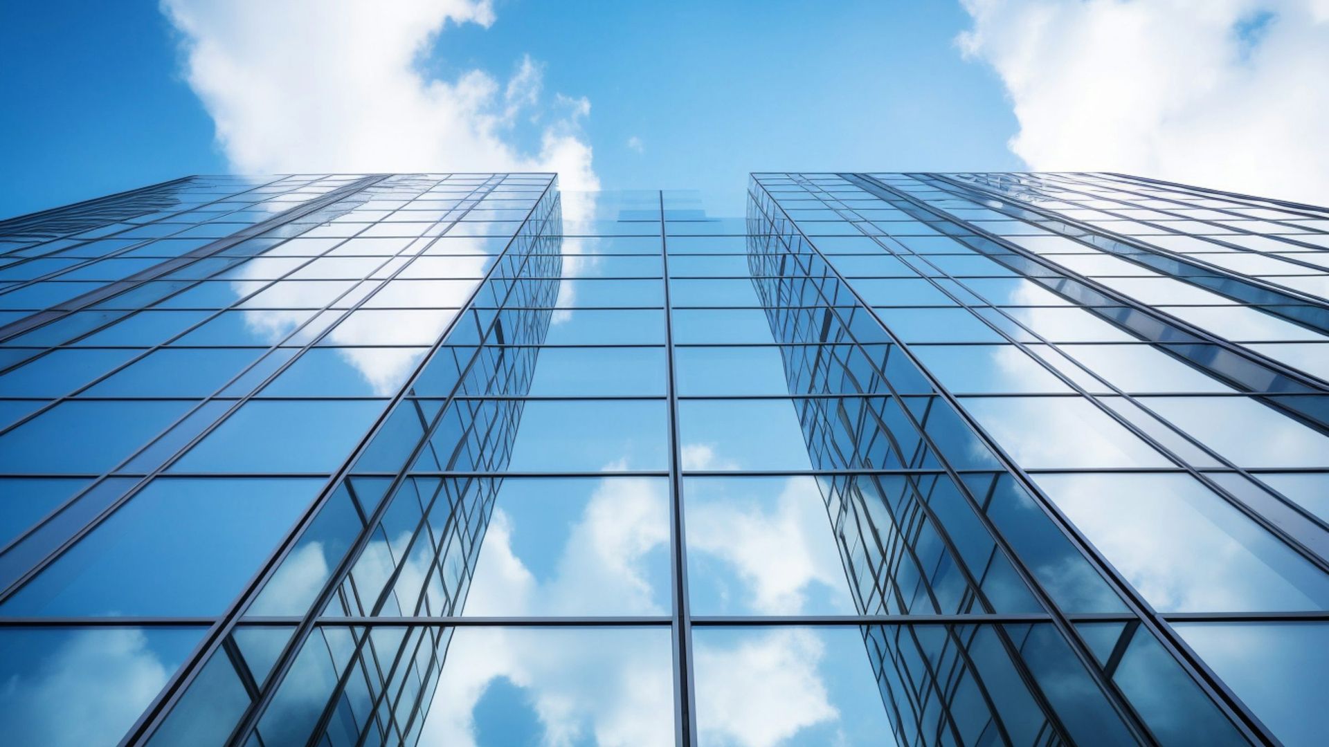 Commercial office building glass facade in afternoon sun