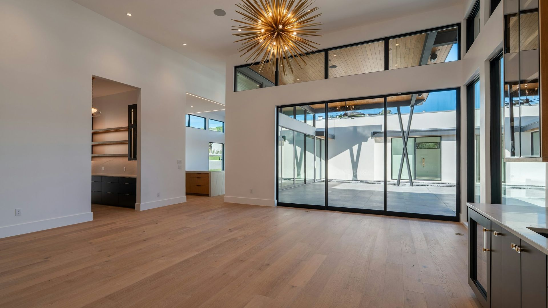 Living room with floor-to-ceiling windows and clear 3M window film